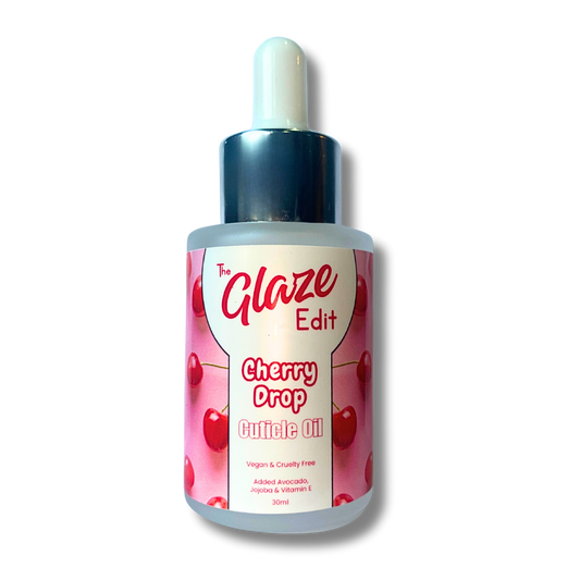 Bottle of 'Cherry Drop' cuticle oil from 'The Glaze Edit' on a white background