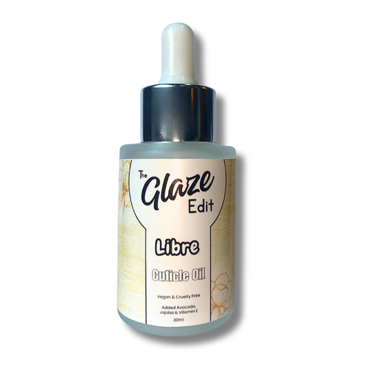 Bottle of 'The Glaze Edit Libre Cuticle Oil' on a white background