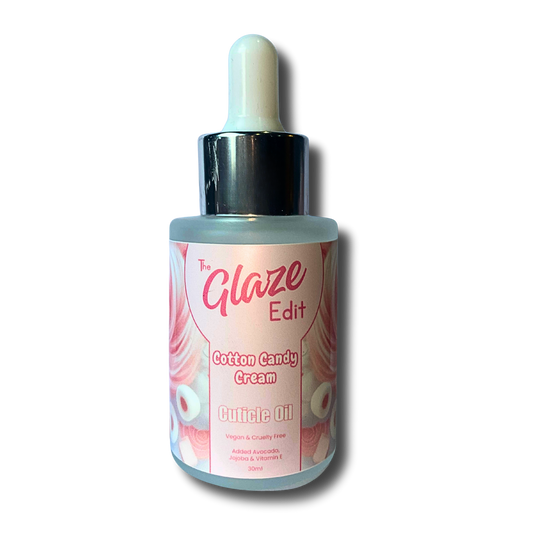Bottle of 'The Glaze Edit' cotton candy cream cuticle oil on a white background